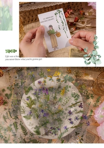 Detailed macro view of vintage PET floral stickers on retro paper and decorative cards