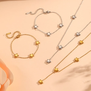 Star pendant necklace and bracelet set in gold and silver stainless steel