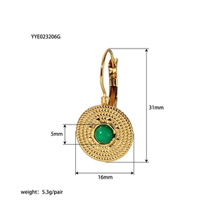 Detailed view of vintage gold pendant featuring turquoise inlay with size measurements