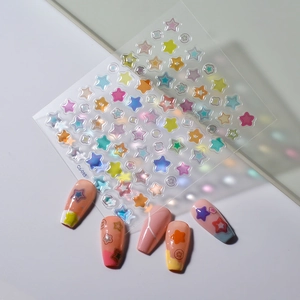Macro detail of colorful jelly star nail art stickers with 3D candy colors on false nails