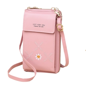 Elegant pink vertical crossbody phone bag with delicate daisy embroidery and gold hardware