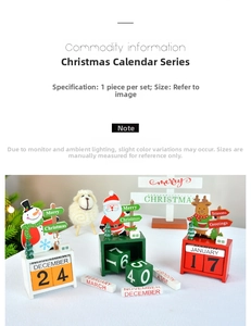 Close-up of wooden Christmas calendar blocks with reindeer and Santa Claus figures