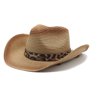 Detailed close-up of woven straw texture and stylish leopard print hat band