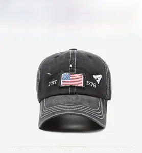 Detail of vintage washed charcoal baseball cap featuring American flag embroidery and stitching
