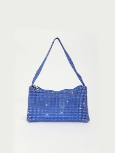 Detailed view of shimmering deep blue rhinestones on the elegant mini evening shoulder bag