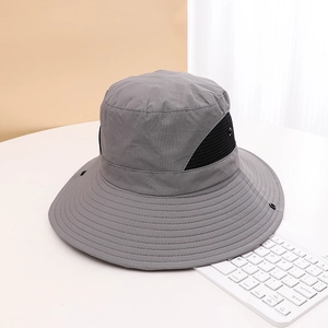 Macro shot of grey UV sun hat featuring side mesh vents and ripstop fabric texture