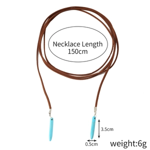 Detail view of 150cm bohemian suede cord necklace with blue turquoise bar pendants