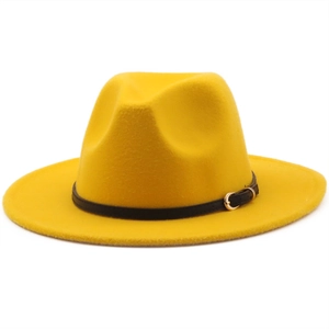 Detail shot of bright yellow wool fedora hat with black leather belt and gold buckle
