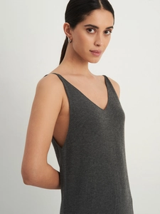 Detail of V-neck dark grey knitted maxi dress with soft premium texture and sleeveless cut