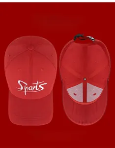Detail of red sports baseball cap with white embroidery and internal mesh lining