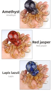 Octopus figurines with amethyst, red jasper, and lapis lazuli crystal stones and gold foil