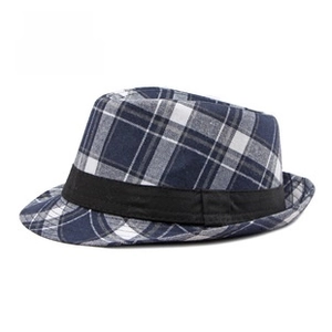 Detail shot of navy blue plaid fedora hat with classic tartan pattern and black band