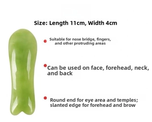 Macro detail of resin guasha tool showing 11cm by 4cm dimensions and ergonomic curves