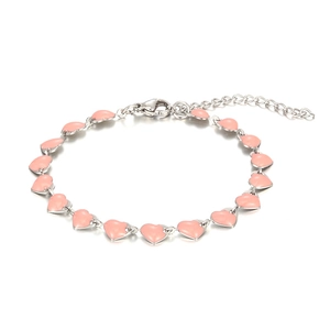 Detail of pink enamel heart bracelet with adjustable silver lobster clasp and extension chain