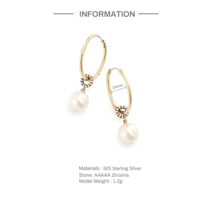 Detailed view of S925 silver pearl drop earrings with AAAAA zircon pavé and gold finish