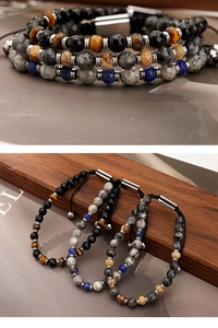 Detail of beaded natural stone bracelets featuring tiger eye, lapis and braided drawstring