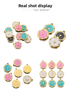 Detailed view of colorful enamel celestial charms in star moon and heart shapes