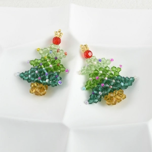Macro detail of handmade Christmas tree crystal beads for jewelry making