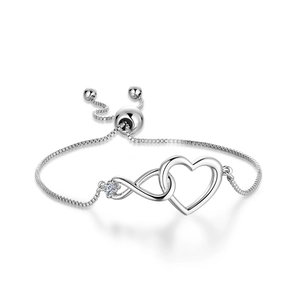 Detail of silver infinity heart bracelet with cubic zirconia and adjustable box chain