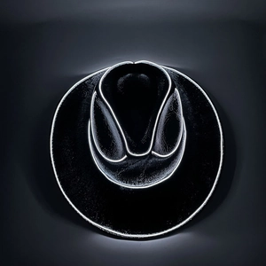 Detail of black cowboy hat with bright white LED strip lighting for rave parties
