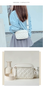 Detail view of cream quilted crossbody bag featuring gold hardware and a wide woven strap