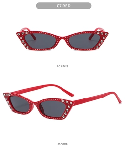 Detailed front and side views of red cat-eye sunglasses with rhinestone embellishments
