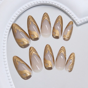 Handmade stiletto press on nails with gold 3D textured sunset gilding on nude base