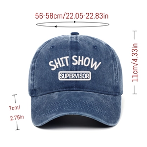 Detail view of navy blue washed cotton cap with SHIT SHOW SUPERVISOR embroidery and size info