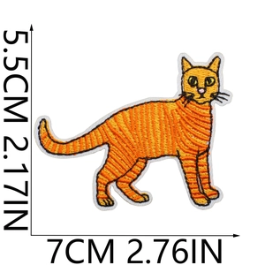 Detailed embroidery patch showing an orange cat with precise 7x5.5cm size markings