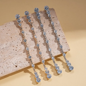 Luxurious geometric round tassel earrings with sparkling crystals in gold and silver finish