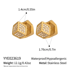 Detailed view of gold stainless steel dice earrings with crystal pavé cubic zirconias