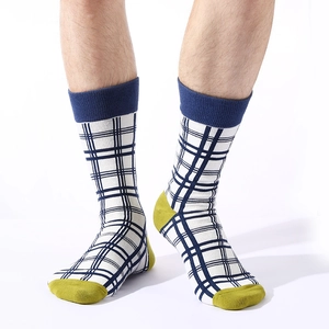 Mens retro checkered crew socks in blue and white patterns with yellow heel and toe
