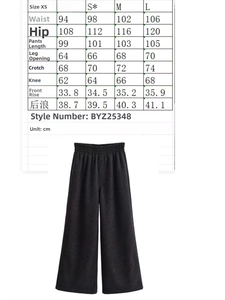Detaillierte Größentabelle für Damen-Revers-Top und weite Hose mit genauen Maßen
