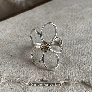 Handcrafted silver floral open ring with golden honeycomb center, 2cm diameter size