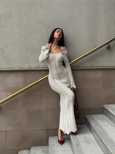 Elegant white V-neck hollow out knit maxi dress with flare sleeves and slim fit