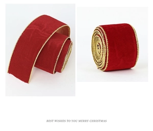 Detail of red velvet ribbon with gold metallic edges for Christmas gift wrapping