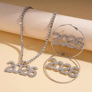 Detail of silver 2026 rhinestone pendant necklace and hoop earrings jewelry set