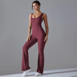 Detail view of deep burgundy yoga jumpsuit featuring U-neck top and flared leg silhouette
