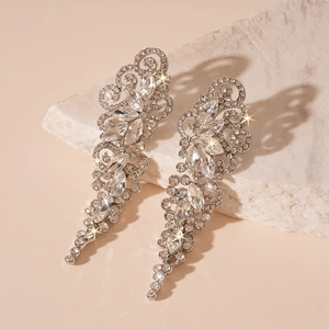 Elegant silver leaf drop earrings with sparkling rhinestones and crystal tassel design
