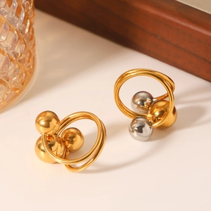 Chic interlocking double hoop gold earrings with metallic beads on a neutral surface