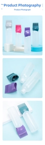 Macro detail of hair dye squeeze bottle with clear scale marks and colorful silicone brush heads