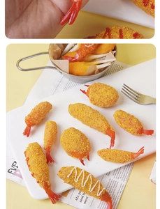 Detailed macro view of realistic tempura fried shrimp models with crispy breadcrumb textures