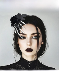 Gothic Halloween hair clip with black rose, spider, and skeleton bone hand on a model