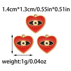 Detail of red heart pendant with evil eye pattern and precise dimension specifications