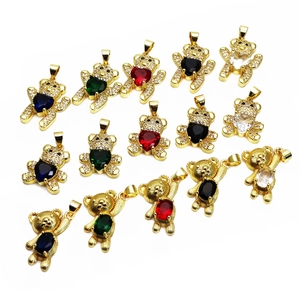Detailed view of assorted bear pendants with micro-set zircon and colorful heart stones