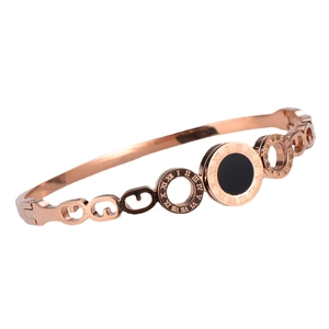 Elegant rose gold titanium steel bangle with Roman numerals and black inlay detail