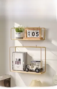 Detail of Nordic golden iron wall shelf set with wood base showing home decor storage