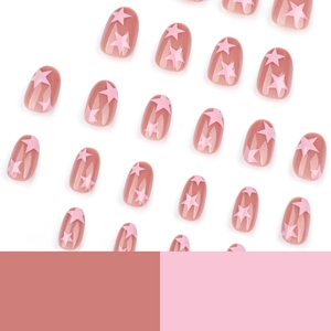 Unghie finte rosa con motivi a stella, forma arrotondata e finitura lucida