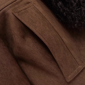 Brown faux suede jacket with dark faux fur trim and detailed stitching on the pockets