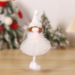 Close-up of white plush Christmas angel doll with lace skirt and silver sequins